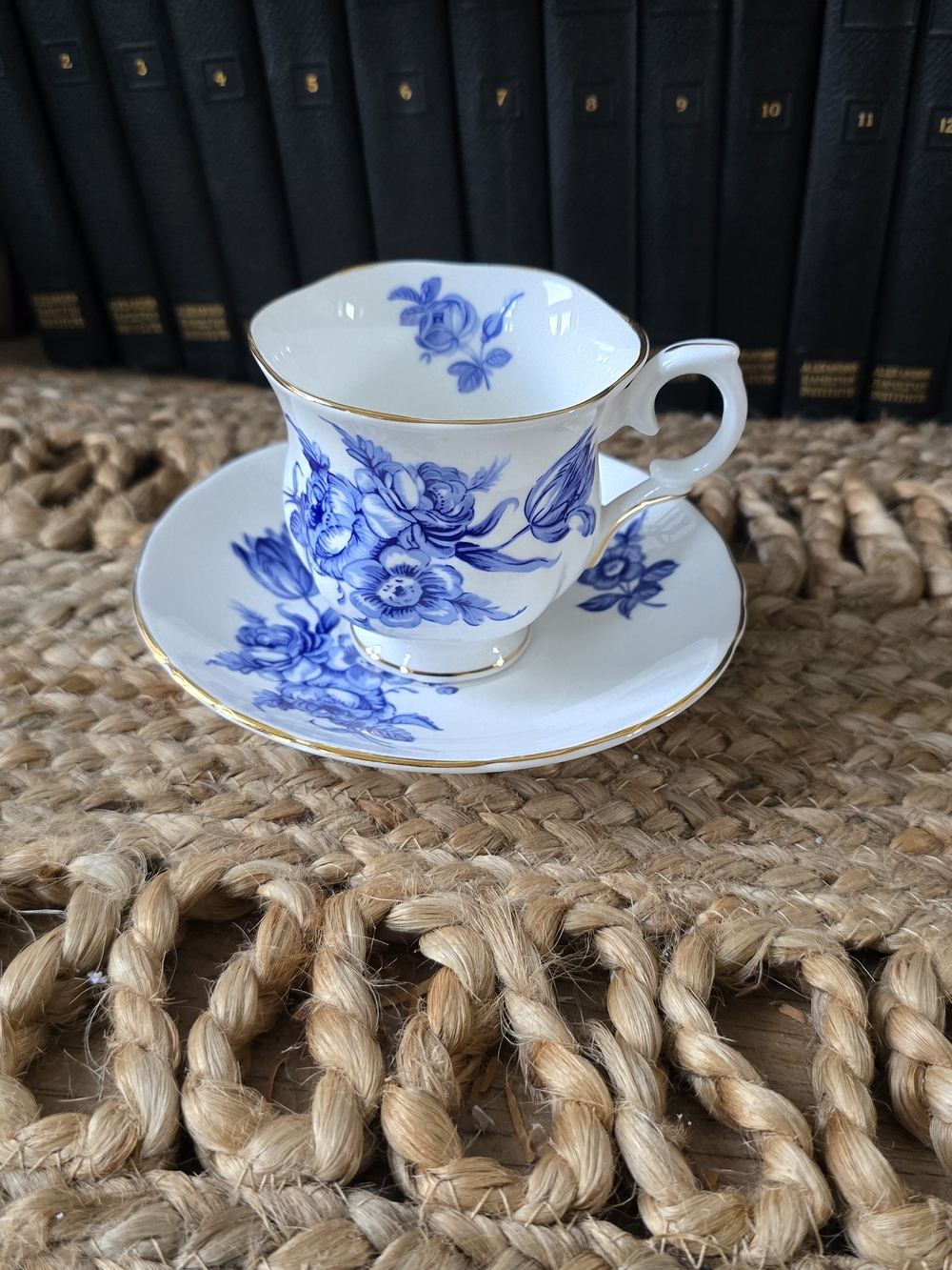 Blue Floral Porcelain Teacup and Saucer with Gold Trim
